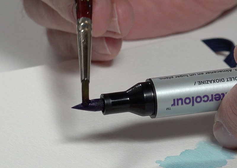 Applying watercolor markers by lifting color from the tip