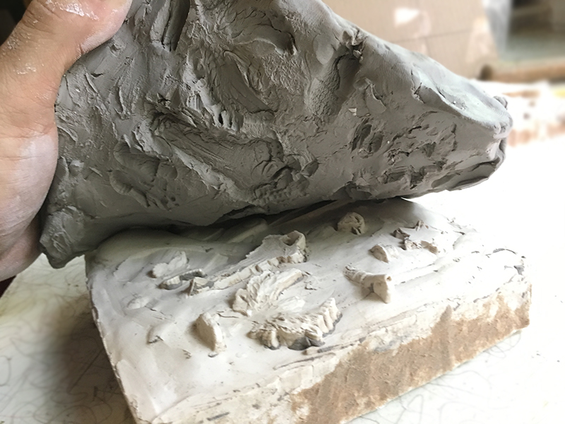 Removing the box and clay mold