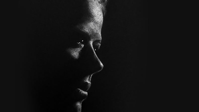 Drawing with white charcoal on black paper
